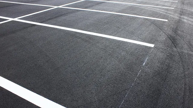 Tarmac parking area with marked bays