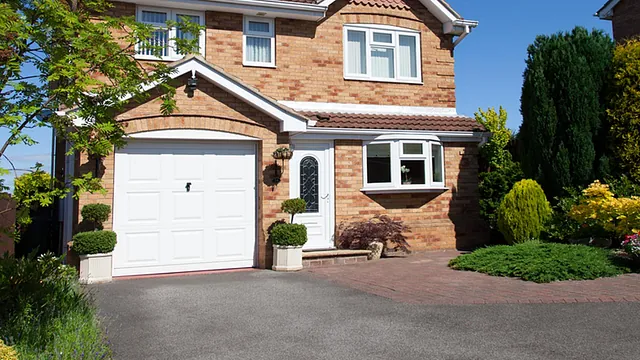 Residential property with a new tarmac driveway