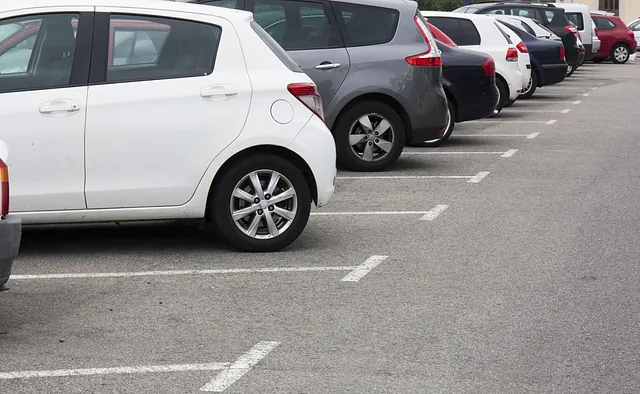 Row of parked cars on a surfaced area